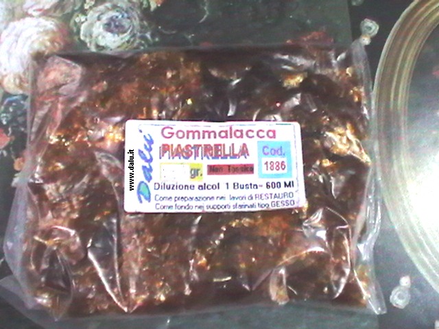clicca qui per rientrare su Gommalacca - Piastrella in scaglie da 60 gr.